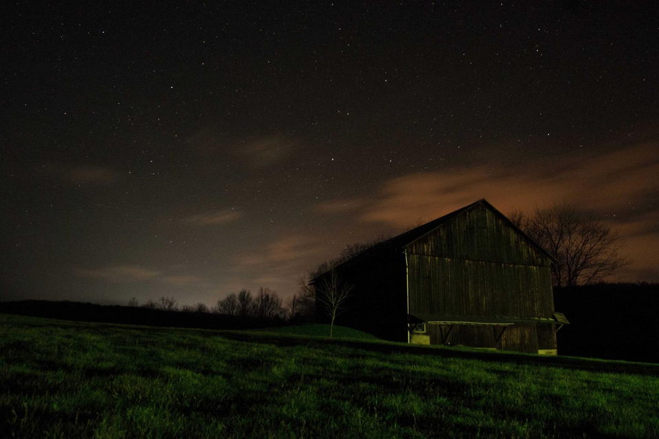 Barn under a clear night sky